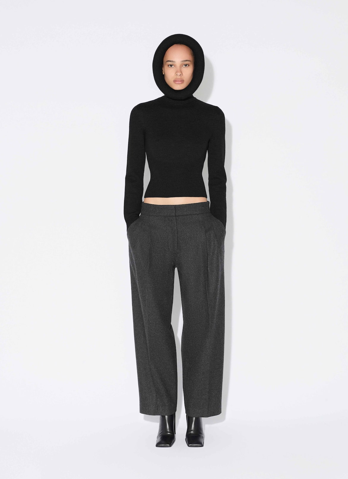 SCULPTURAL HOOD RIBBED KNIT JUMPER ALAÏA BLACK SCULPTURAL HOOD RIBBED KNIT JUMPER